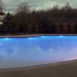 Террасная доска UnoDeck-RusDecking вокруг бассейна